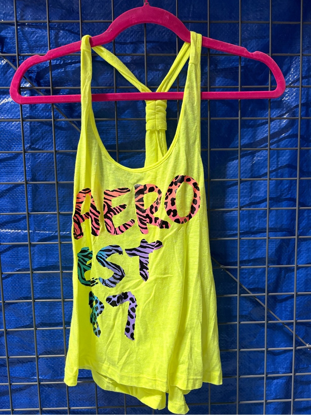 Neon Yellow Racerback Tank with Colorful Leopard Print Text